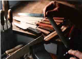 Shaping a knife handle with a  file